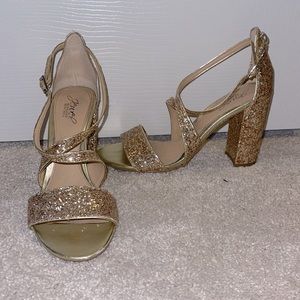 Beautiful gold shoes that go with the sherri hill dress on my page!